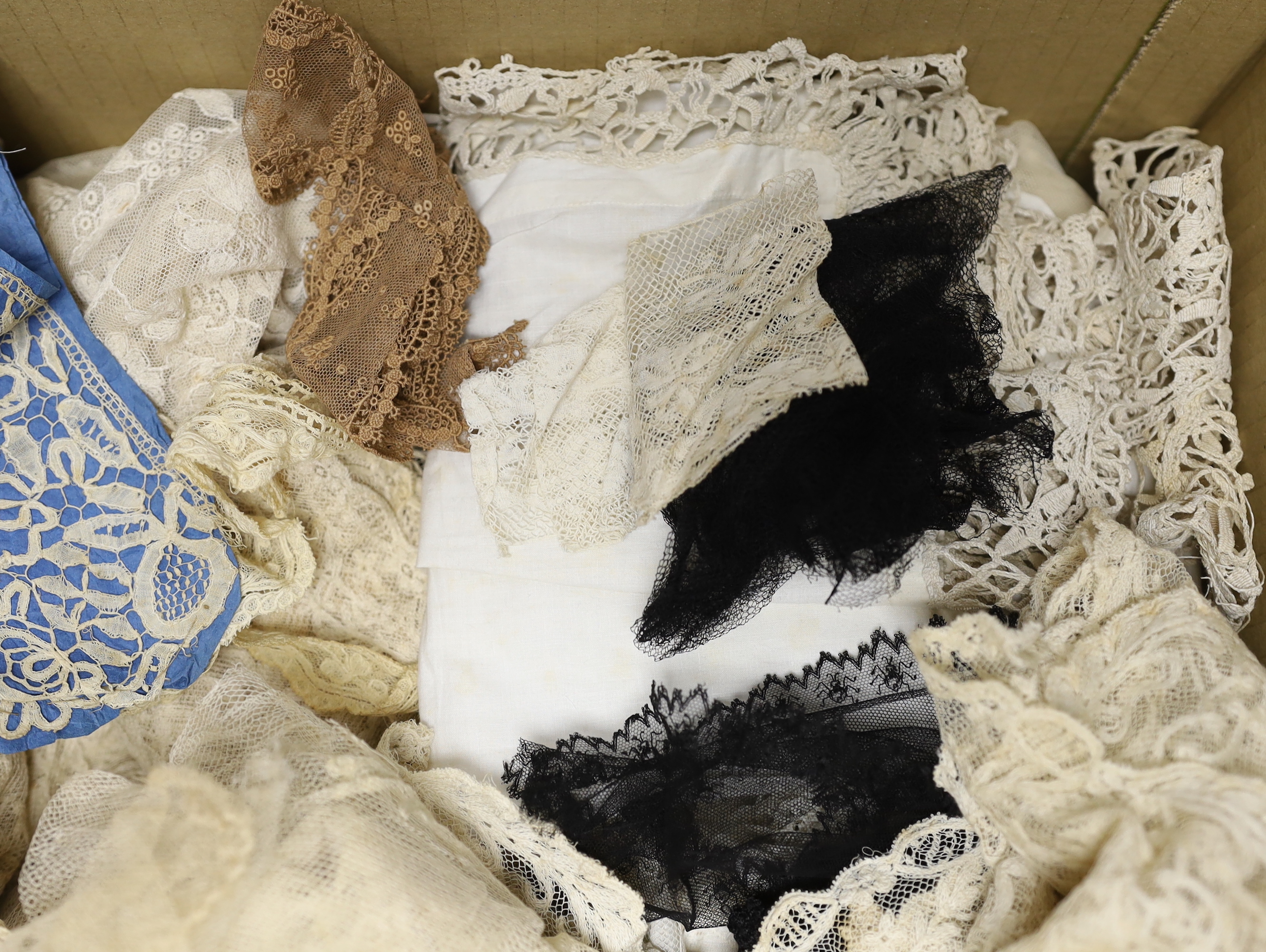 19th century mixed hand made and machine lace: a cream lace needle run bonnet veil, a similar stole and two lengths of wide trimming, together with other lace items and a quantity of black lace